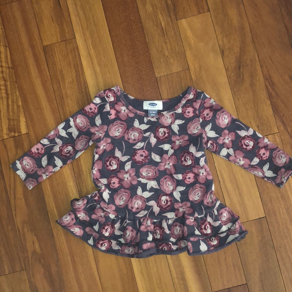 Peplum sweater dress with rose detail. Perfect